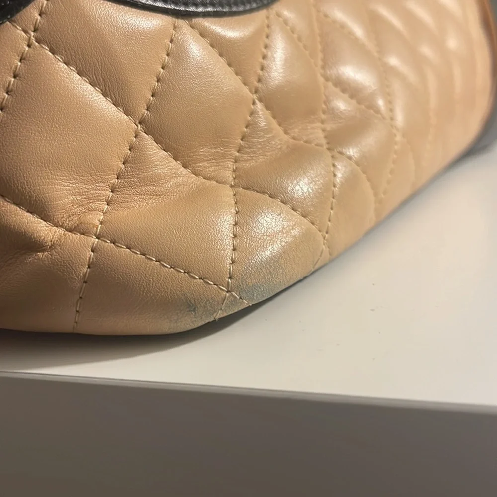 CHANEL Beige Quilted Tote with Black Accents